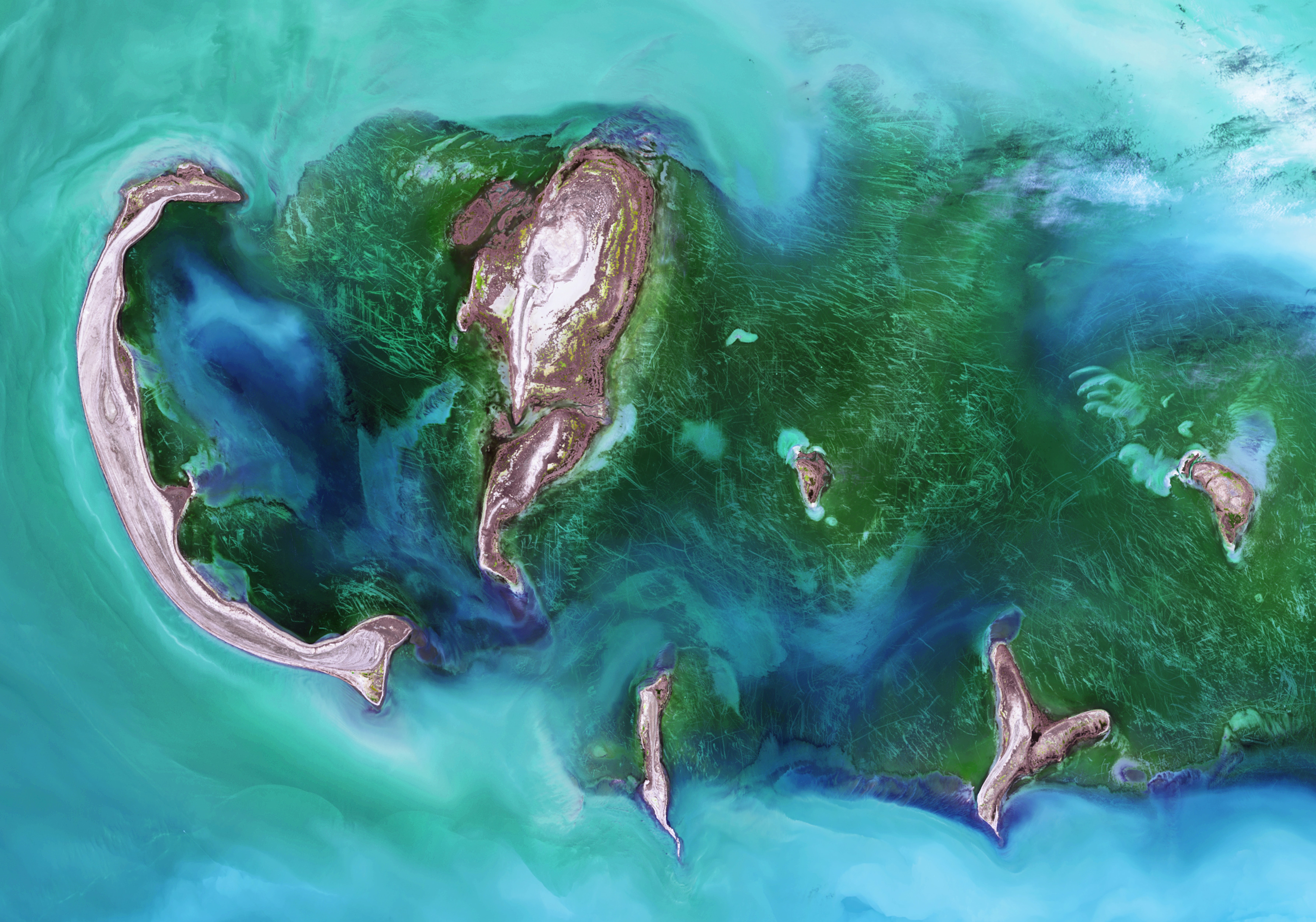 A bird's-eye view of a archipelago. (Photo by USGS, Unsplash)